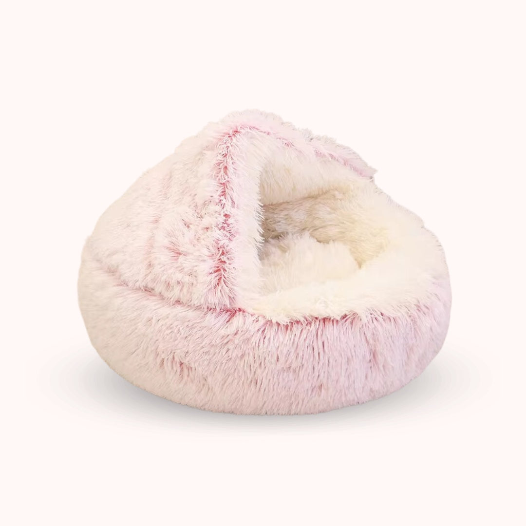 Pink plush CharmPaws Luxe Kalmerend Slaapnest for cats and small dogs, cozy and soft pet bed with plush fabric.